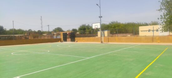 Réalisation d'un plateau omnisports à Toma