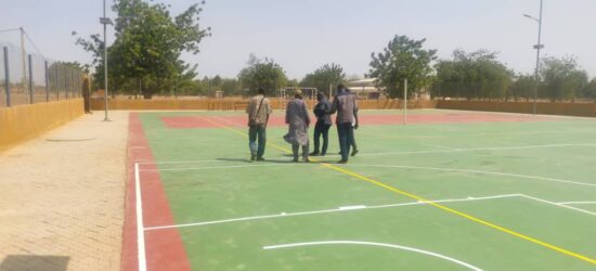 Réalisation d'un plateau omnisports à Toma