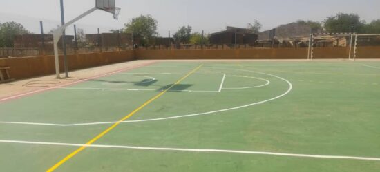 Réalisation d'un plateau omnisports à Toma